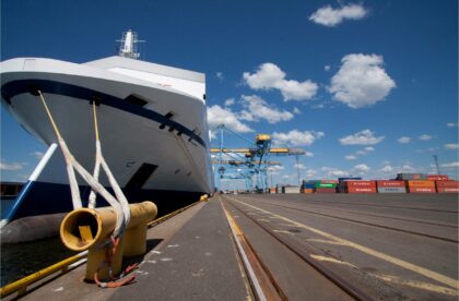 Container vessel at the berth of HaminaKotka port in Finland. Hacklin Hamiko - cargo transportation by sea