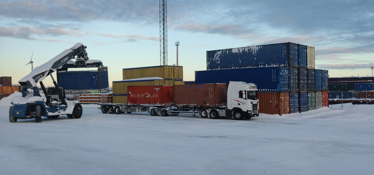 container lift from truck to container yard at depo in finland hamina kotka port