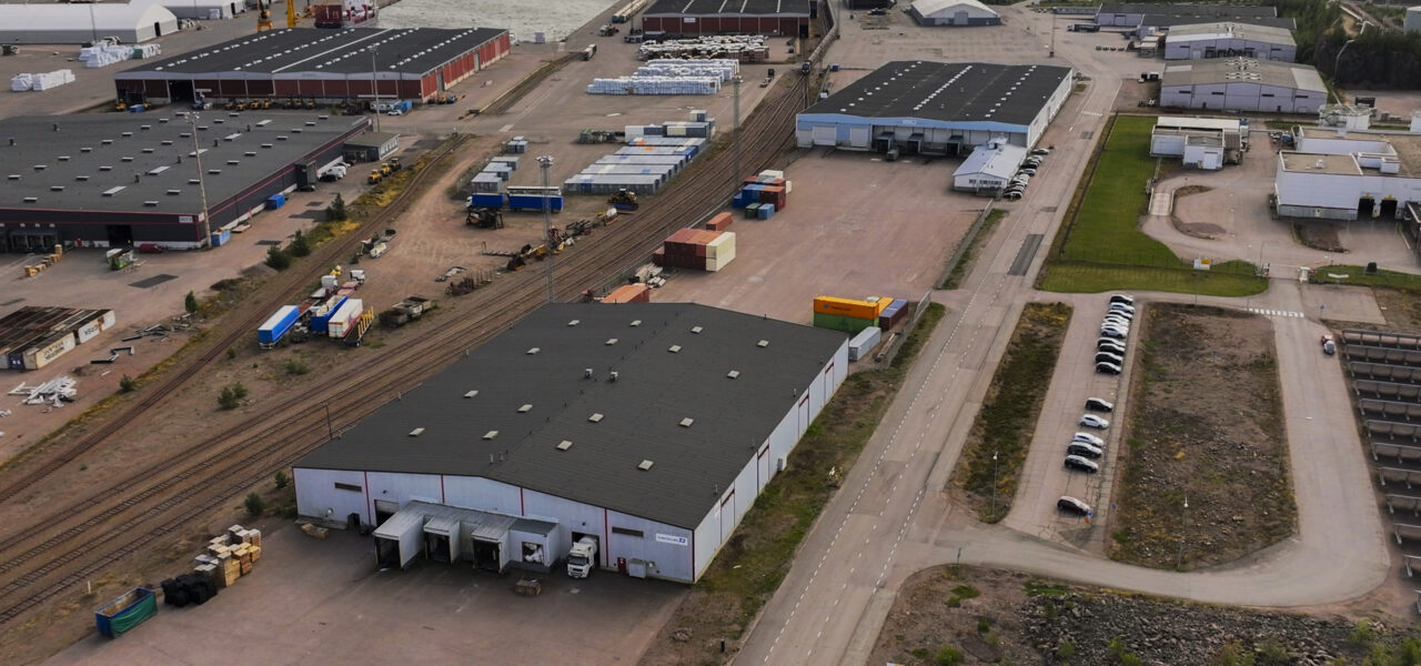 Warehousing, rail connections, and freight handling facilities supporting multimodal logistics operations in HaminaKotka, Finland.