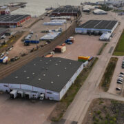 Warehousing, rail connections, and freight handling facilities supporting multimodal logistics operations in HaminaKotka, Finland.