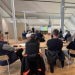 Participants attending the final seminar of the ViseLog project, listening to a presentation on sustainable logistics and the green transition at Xamk in Kotka.
