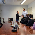 Hacklin Hamiko employees celebrating a 25-year work anniversary at the company's Hamina office.